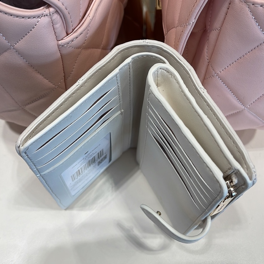 Kate Spade Carey Medium Compartment Bifold Wallet 
COLOR: Parchment - Picture 9 of 16